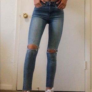 Cropped and ripped jeans
